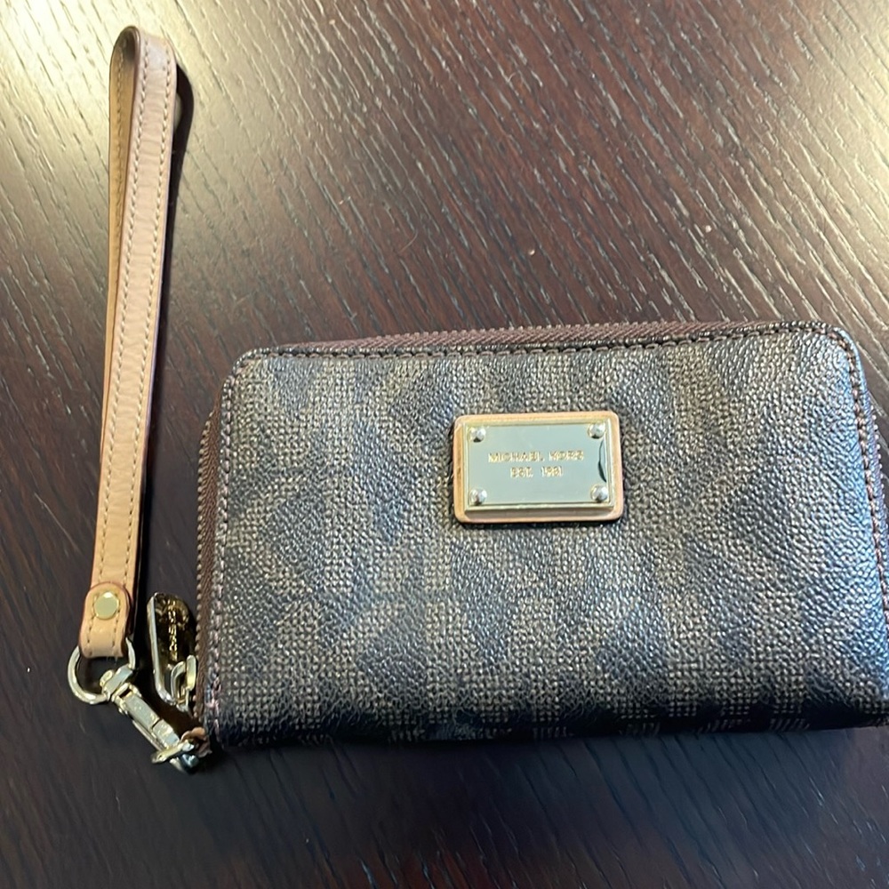 Michael Kors Wristlet - brown 5 1/2 x 3 1/2 approx